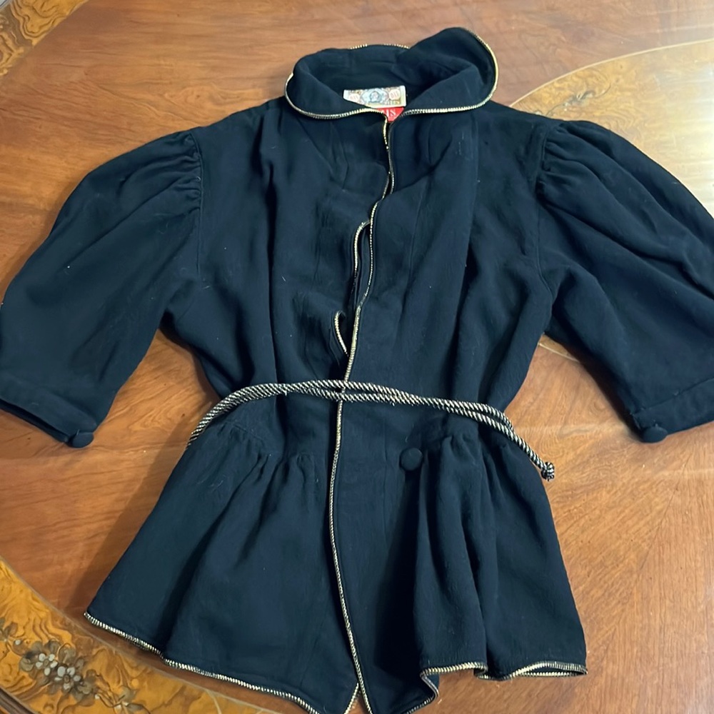 European black pant and jacket size 40 which is a 10 but I’d say more like an 8